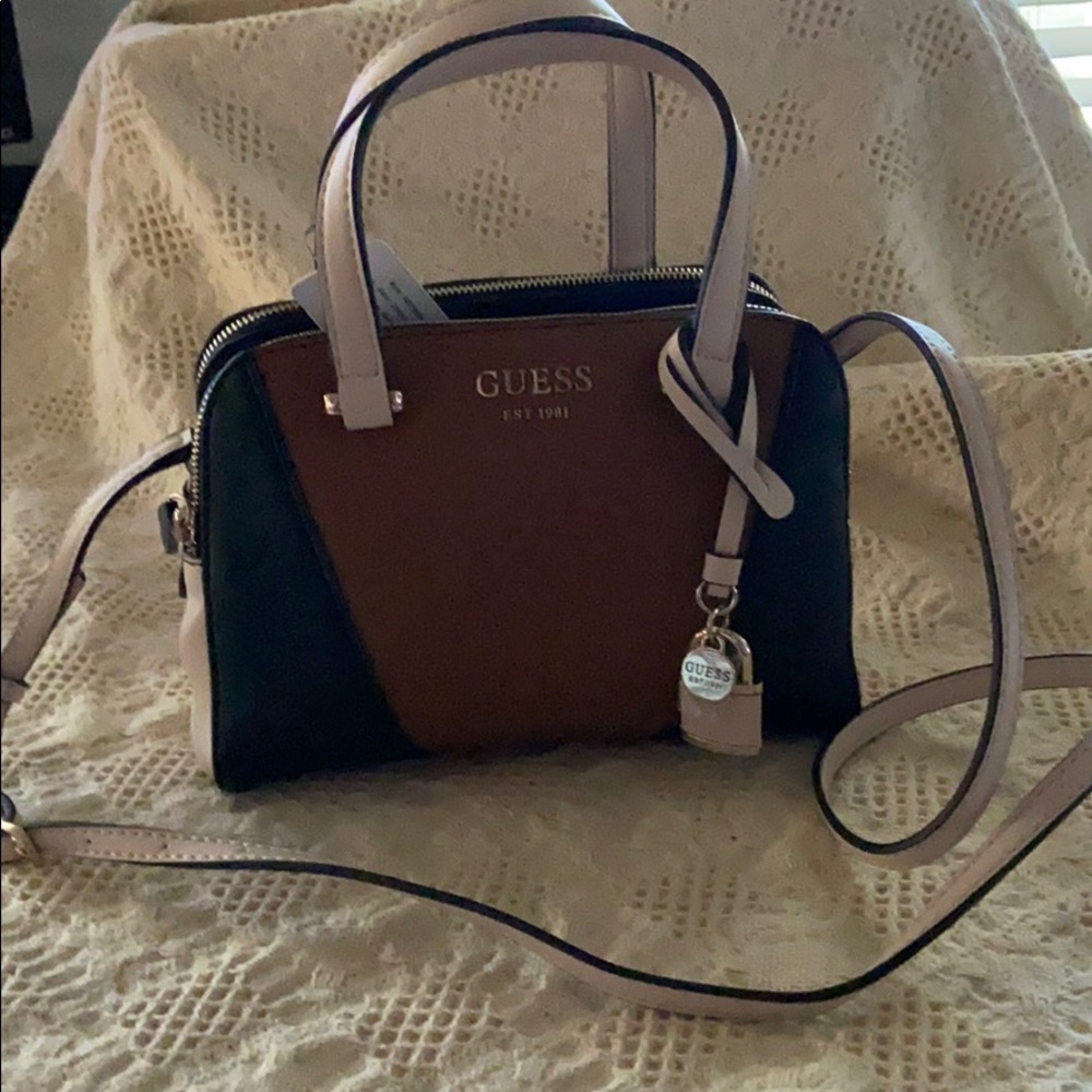 Guess tan and cream purse